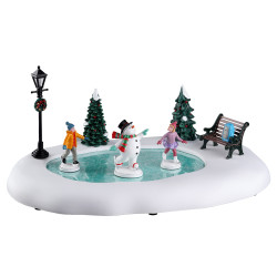 Bonhomme de neige à la patinoire animé LEMAX