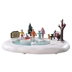 Famille à la patinoire animée LEMAX